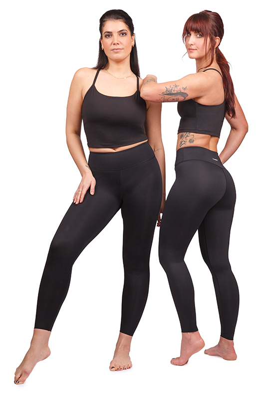 Zwei Modelle tragen schwarze MOTION Kompressionsleggings mit hohem Bund – Vorder- und Rückansicht